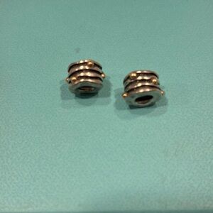 Pandora sterling silver beads with 14k gold dots. Retired.